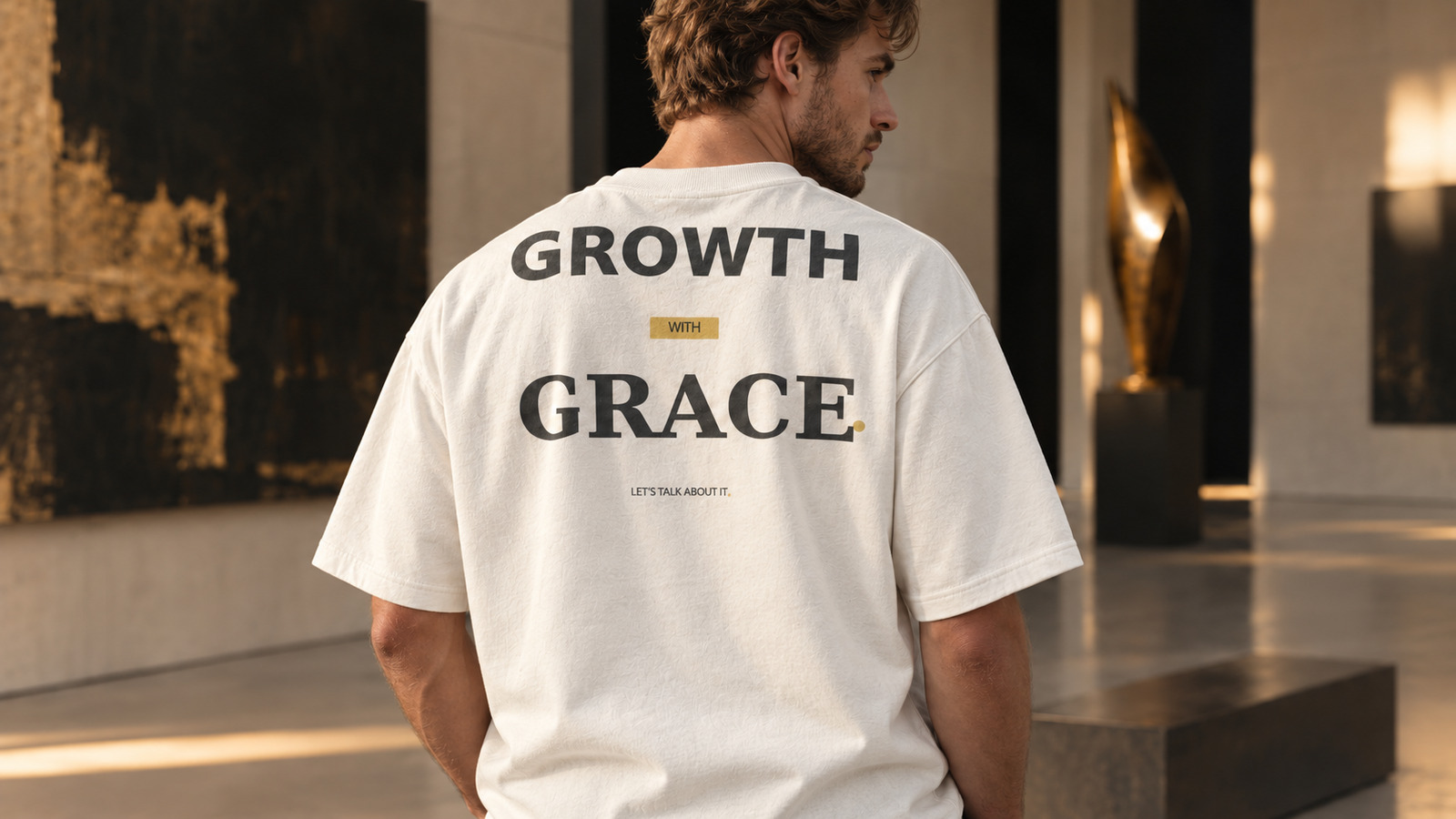 White model wearing the Growth With Grace statement tee in Ivory